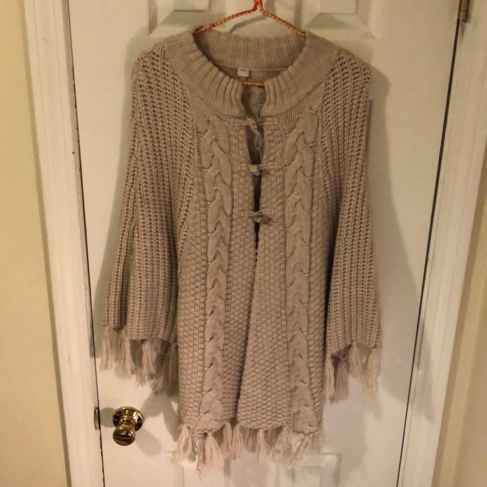 Poncho knit by S. Oliver